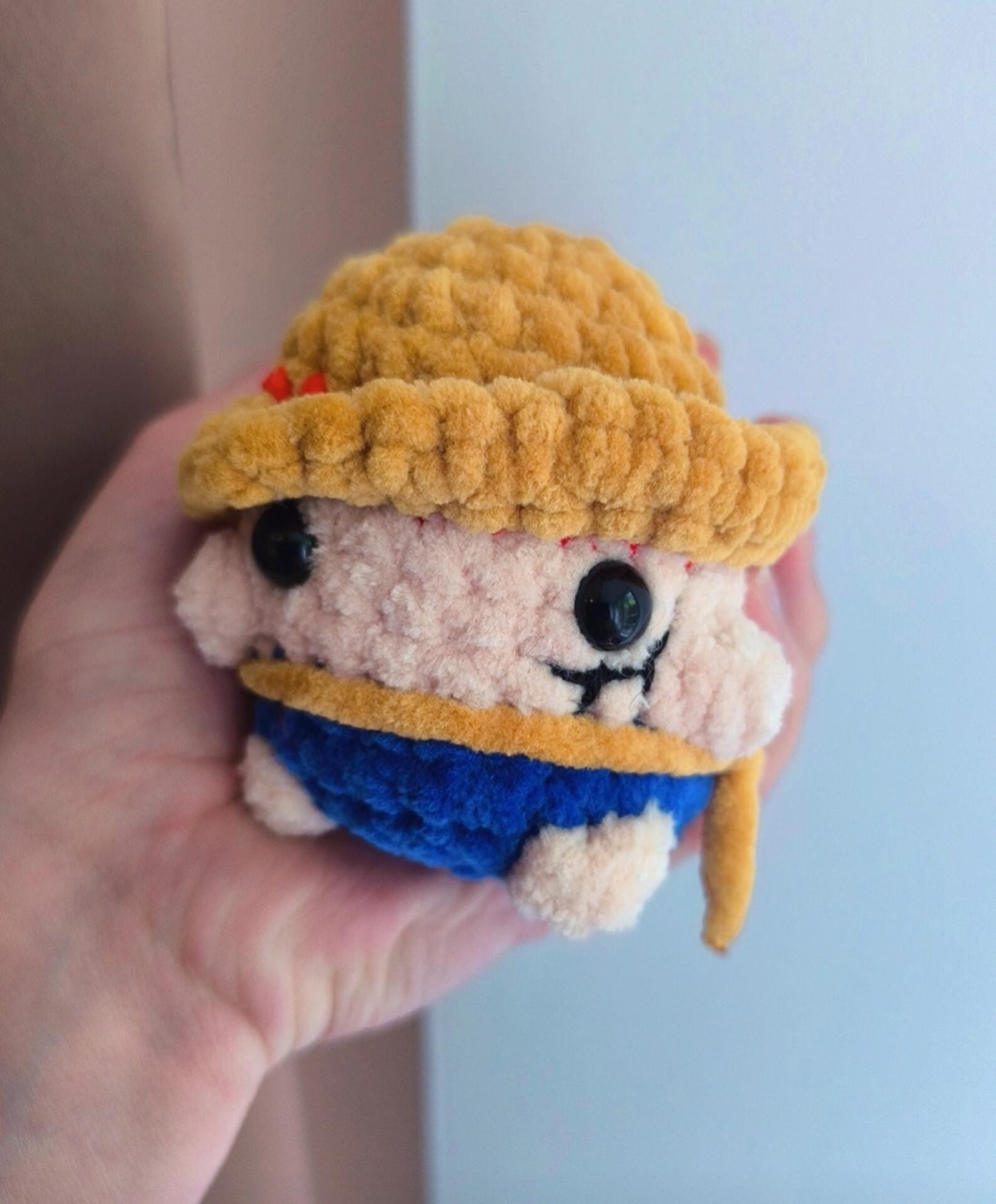 Handmade crochet pirate boy plushie
